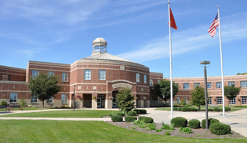 Image of an educational academy on a sunny day