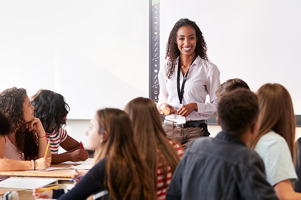 A woman teacing a class