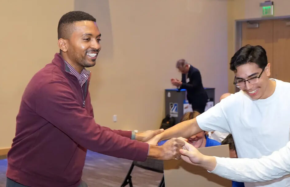  Diego King, is congratulated by fellow contestants.