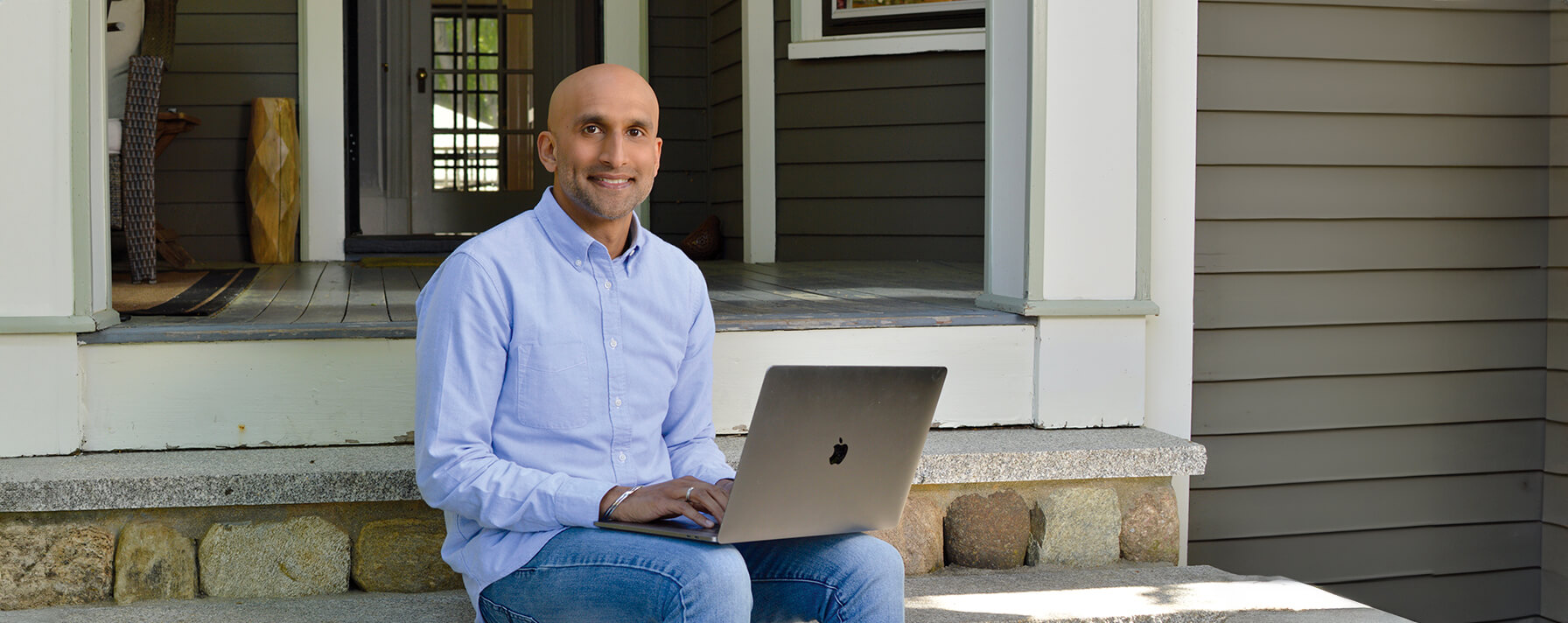 Online grad student on front porch