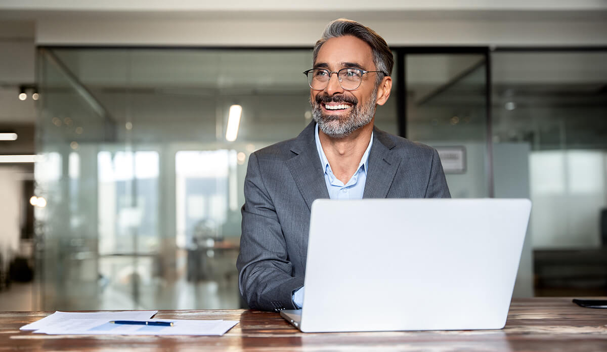 Happy accountant in a meeting at the office